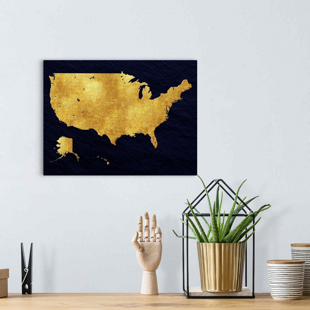 A bohemian room featuring Gold and navy map of the United States of America.