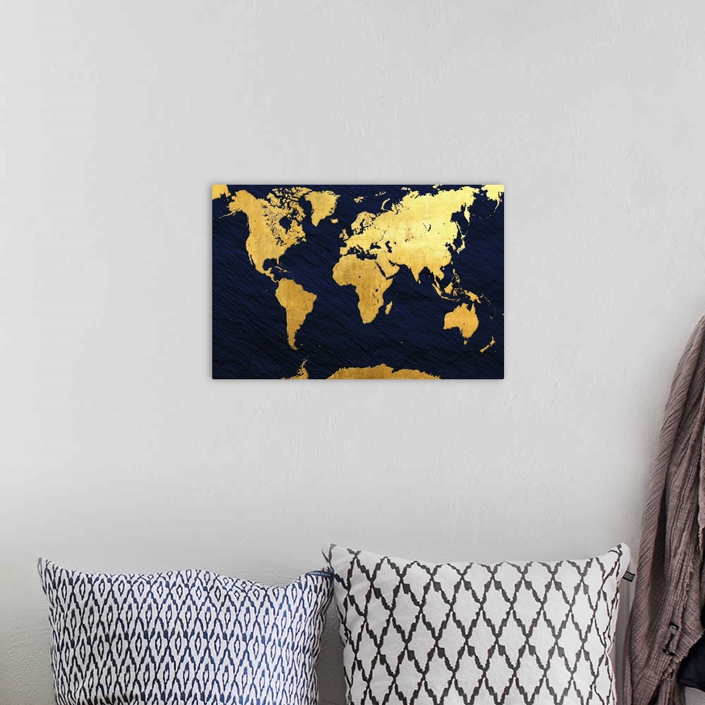 A bohemian room featuring Gold and navy map of the World.
