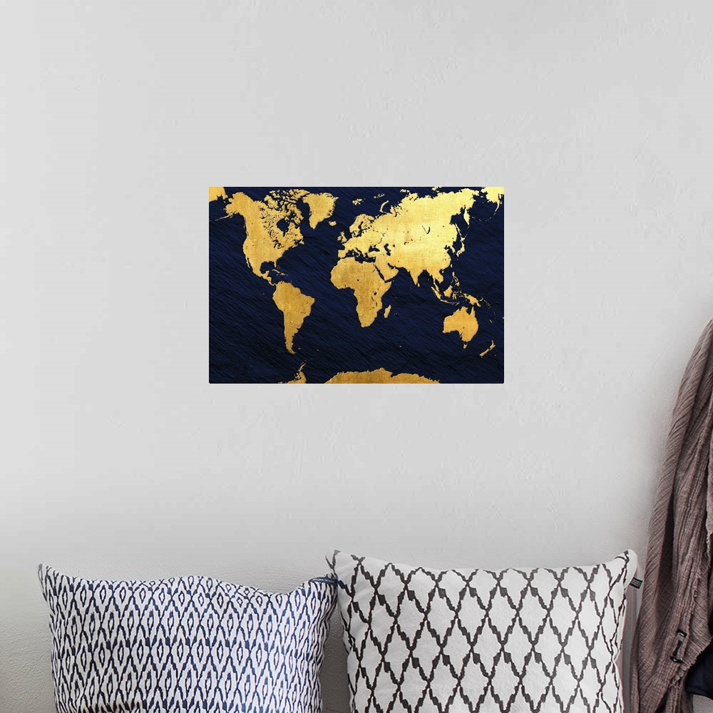 A bohemian room featuring Gold and navy map of the World.