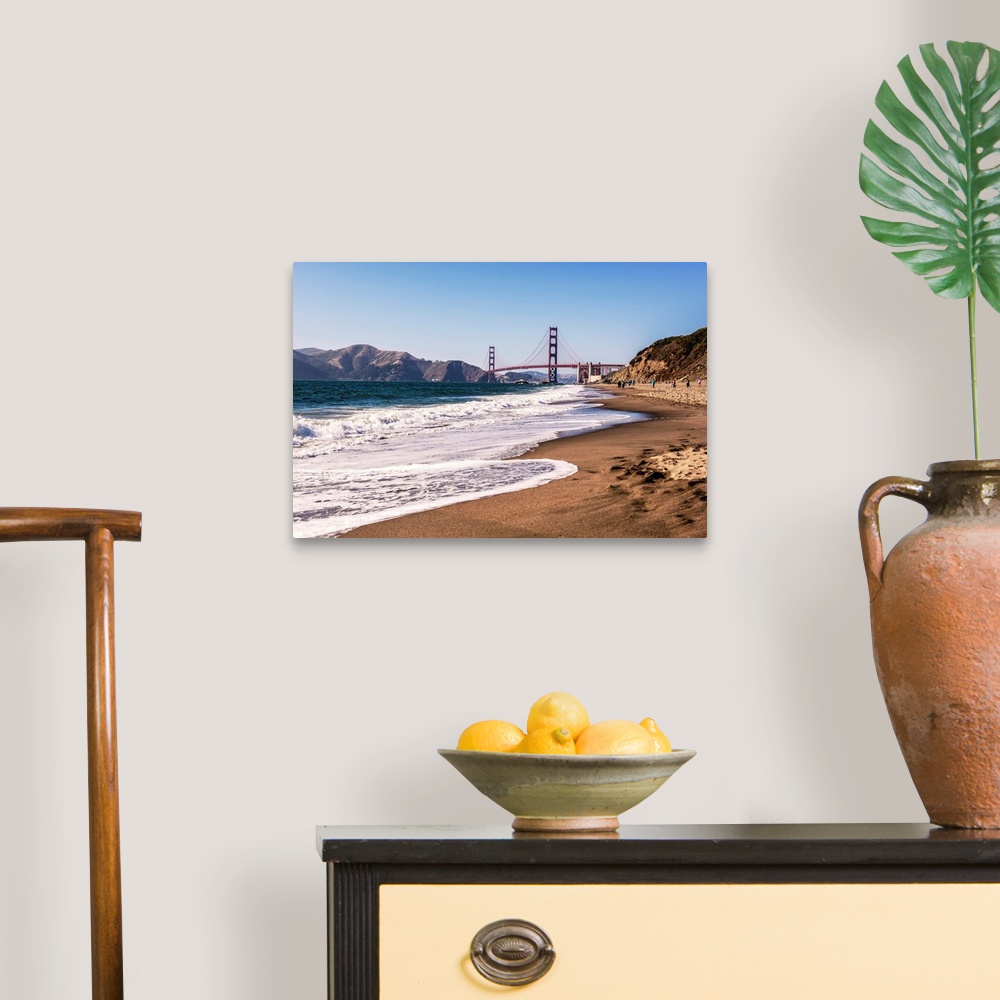 A traditional room featuring Landscape photograph of a view of the Golden Gate Bridge from the pacific coast.