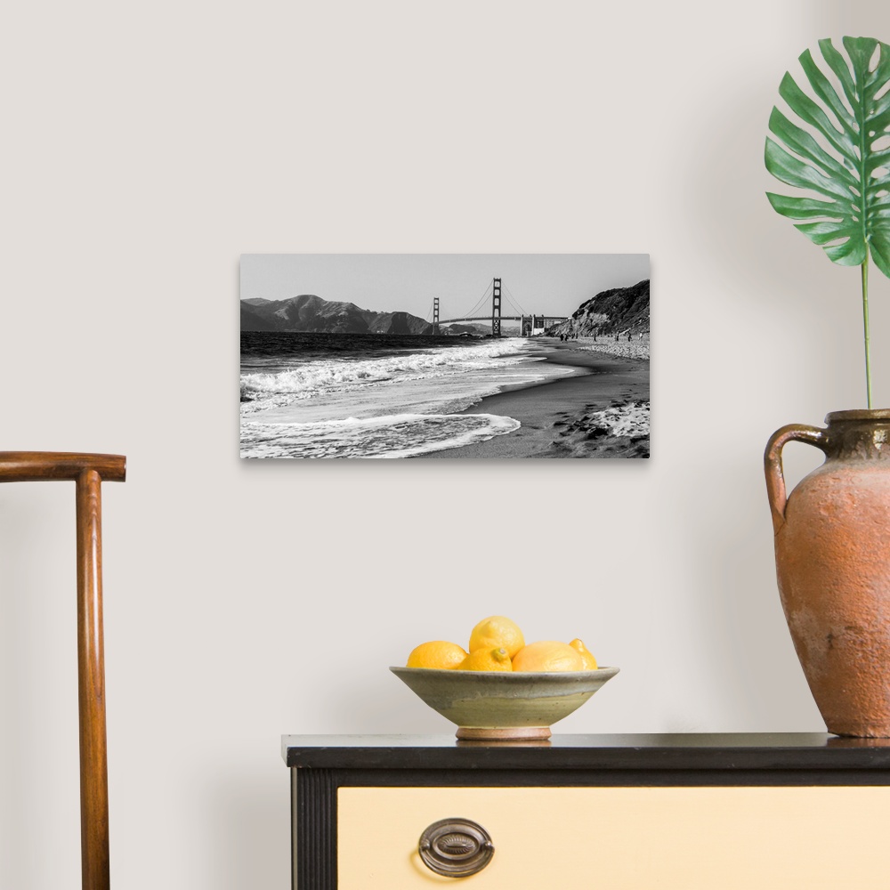 A traditional room featuring Landscape photograph of a view of the Golden Gate Bridge from the pacific coast.