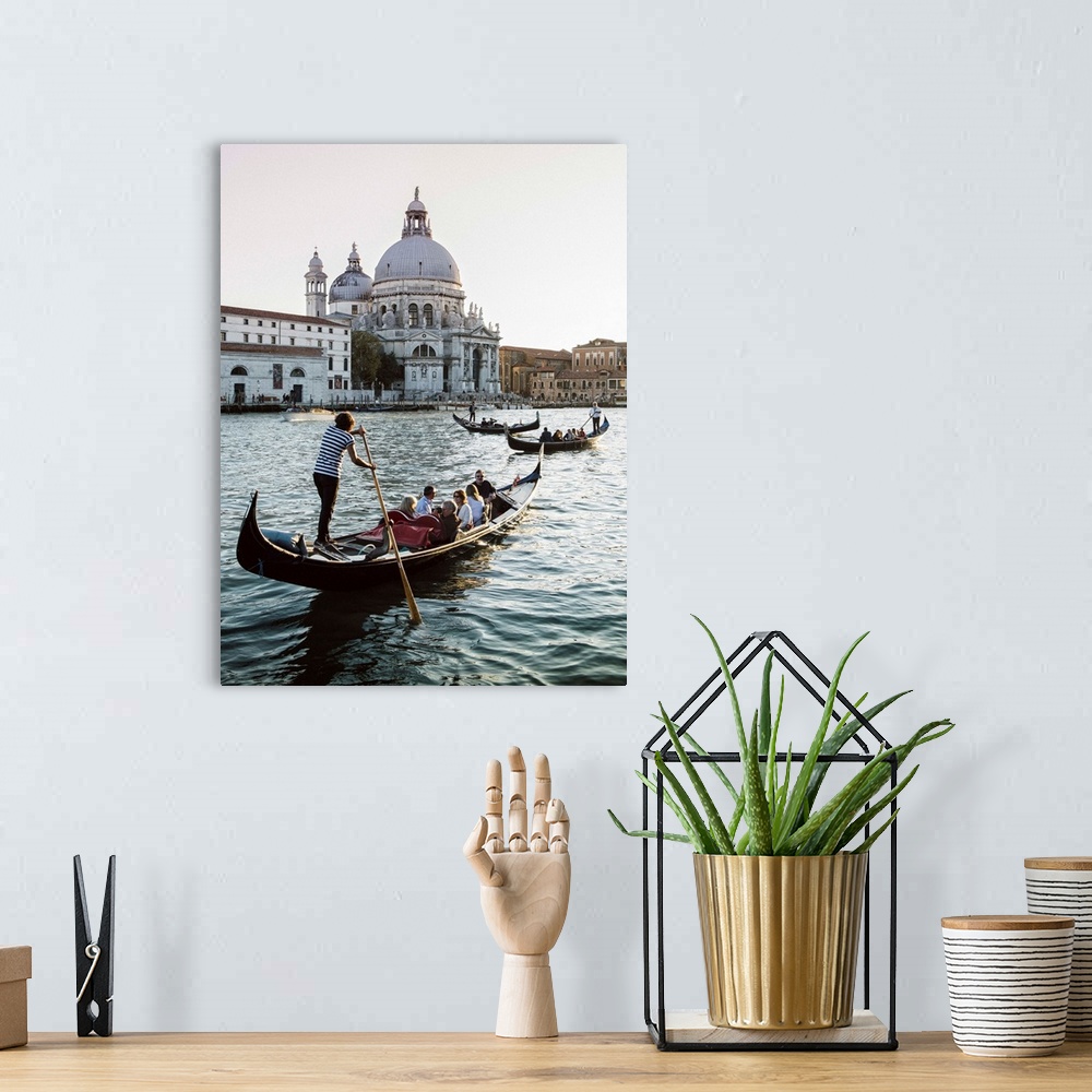A bohemian room featuring Photograph of gondolas rowing in front of Santa Maria della Salute in Venice.
