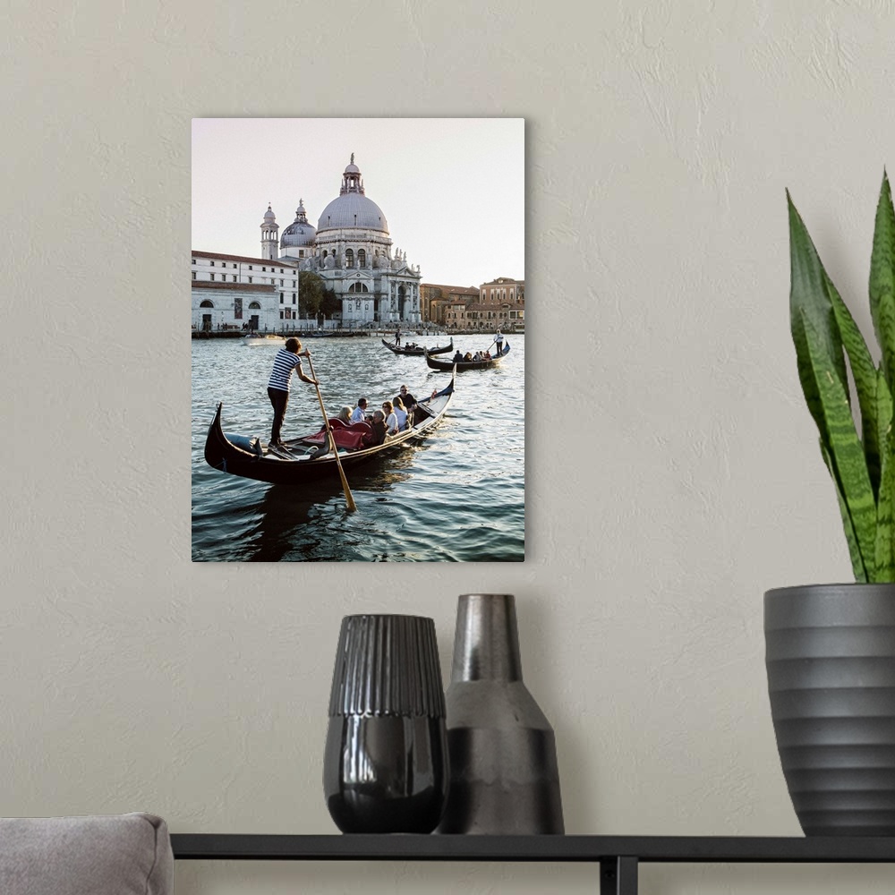 A modern room featuring Photograph of gondolas rowing in front of Santa Maria della Salute in Venice.