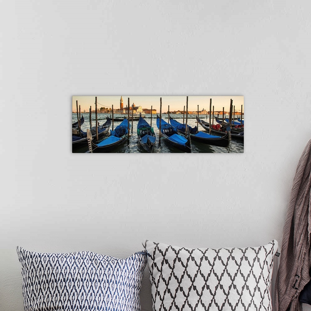 A bohemian room featuring Panoramic photograph of a row of docked gondolas with St. Mark's Square (Piazza San Marco) in the...