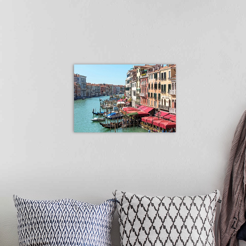 A bohemian room featuring Landscape photograph of buildings and gondolas on the Grand Canal in Venice.