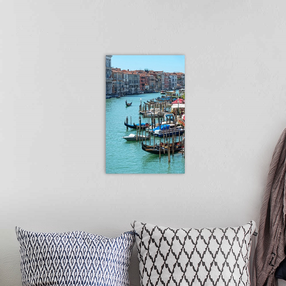 A bohemian room featuring Photograph of docked gondolas and boats on the Grand Canal in Venice.
