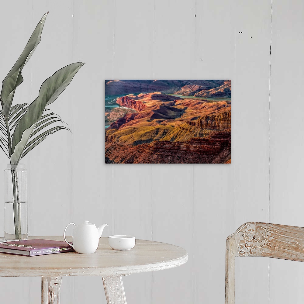 A farmhouse room featuring Landscape photograph of the Colorado River winding through the Grand Canyon.