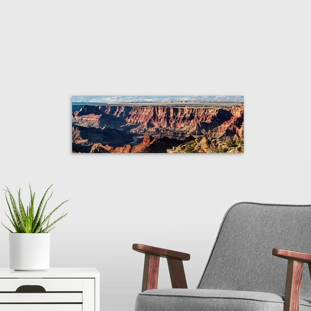 A modern room featuring Panoramic photograph of Grand Canyon National Park.
