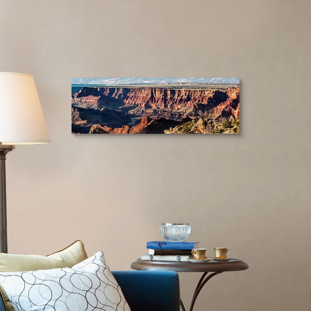 A traditional room featuring Panoramic photograph of Grand Canyon National Park.