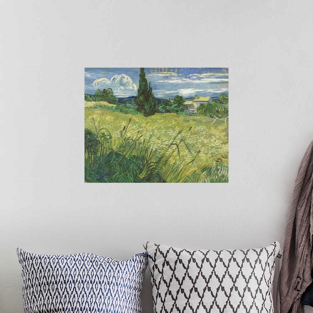 A bohemian room featuring Vincent van Gogh - Green Field.