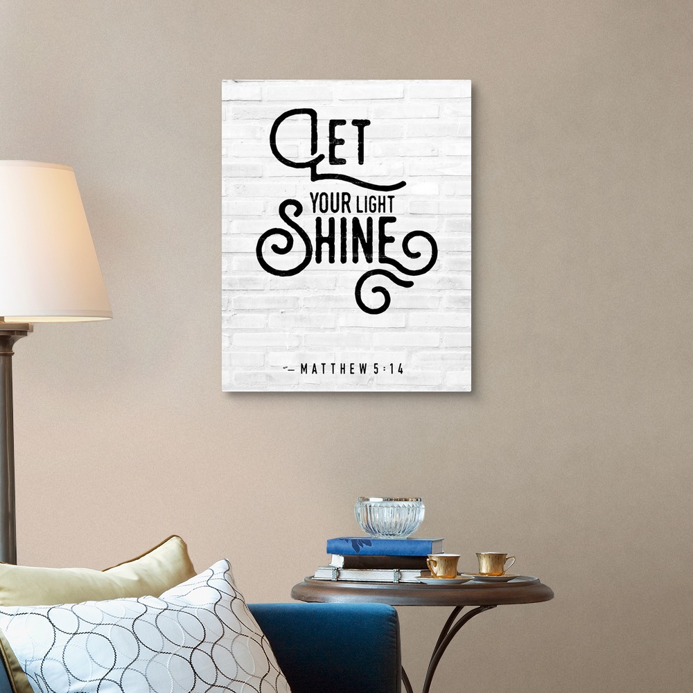 A traditional room featuring A Bible Verse stating 'Let your Light Shine' in a modern black font against a faux white brick ba...