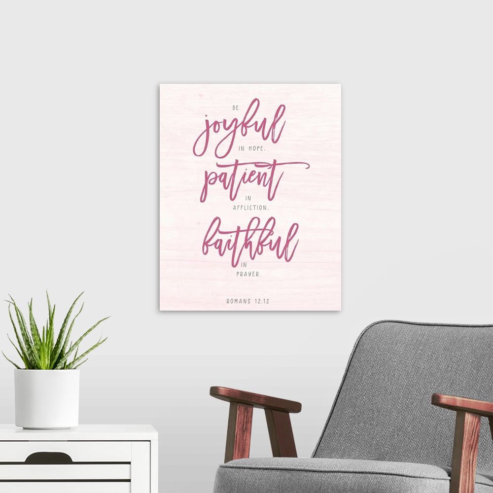 A modern room featuring A reminder of how to live well in hot pink lettering on a pale pink background.
