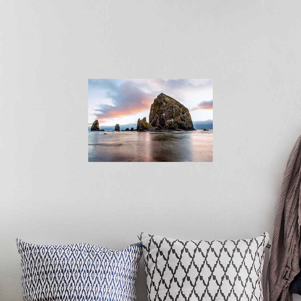 A bohemian room featuring View of a giant sea stack called, "Haystack Rock" at Cannon Beach in Portland, Oregon.