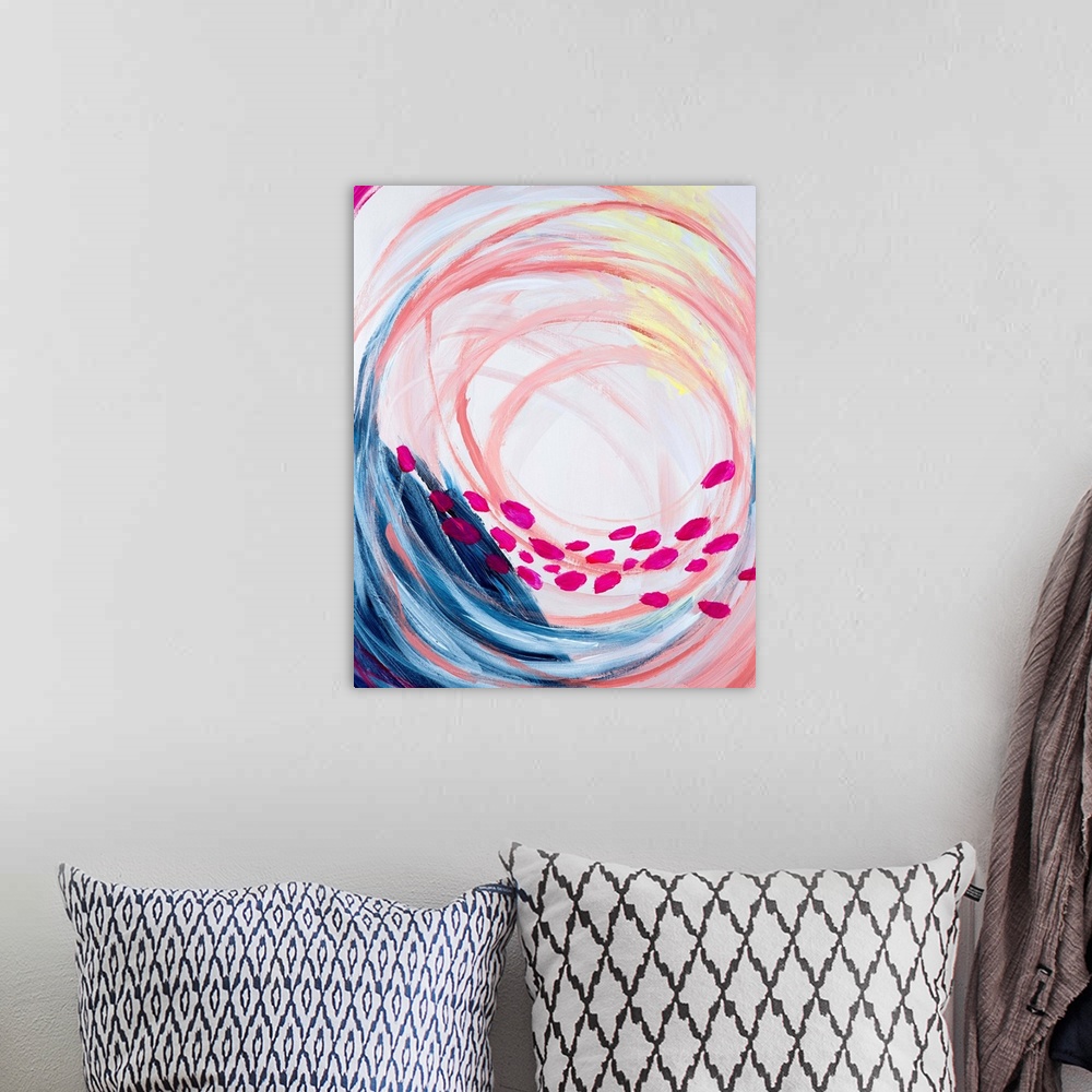 A bohemian room featuring Contemporary abstract painting in vivid rainbow colors, swirling in the center, with a row of pin...