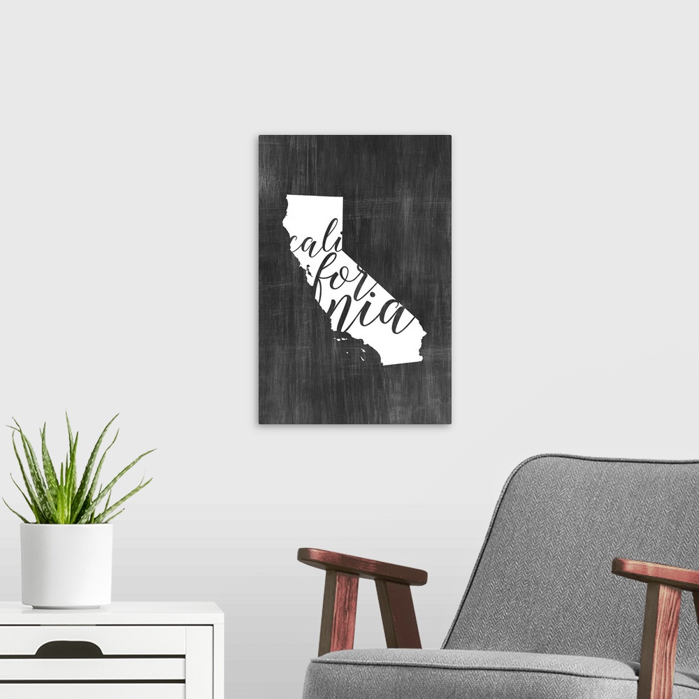 A modern room featuring California state outline typography artwork.