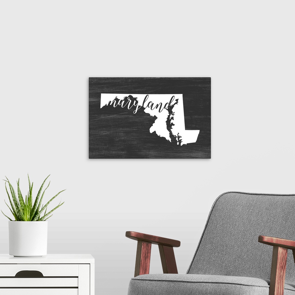 A modern room featuring Maryland state outline typography artwork.