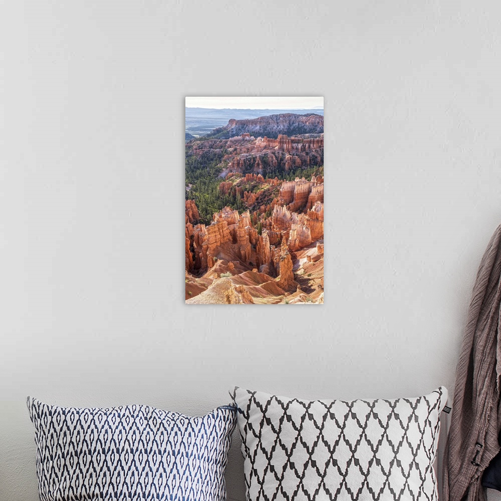 A bohemian room featuring Rocky hoodoos and lush pine forests contrast in Bryce Canyon National Park, Utah.