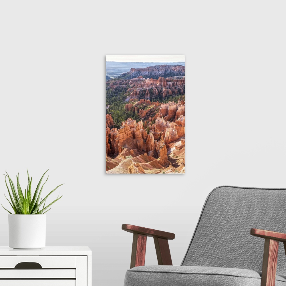 A modern room featuring Rocky hoodoos and lush pine forests contrast in Bryce Canyon National Park, Utah.