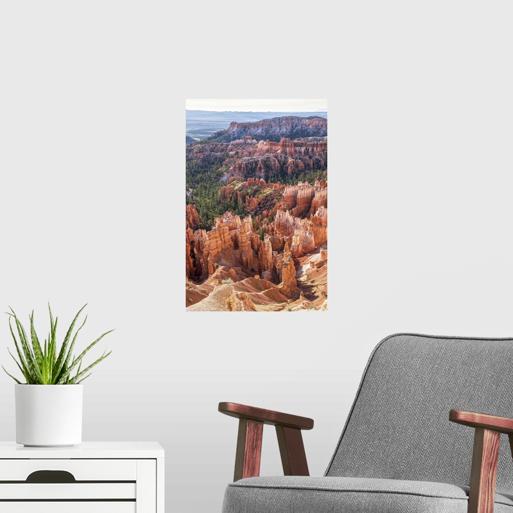 A modern room featuring Rocky hoodoos and lush pine forests contrast in Bryce Canyon National Park, Utah.