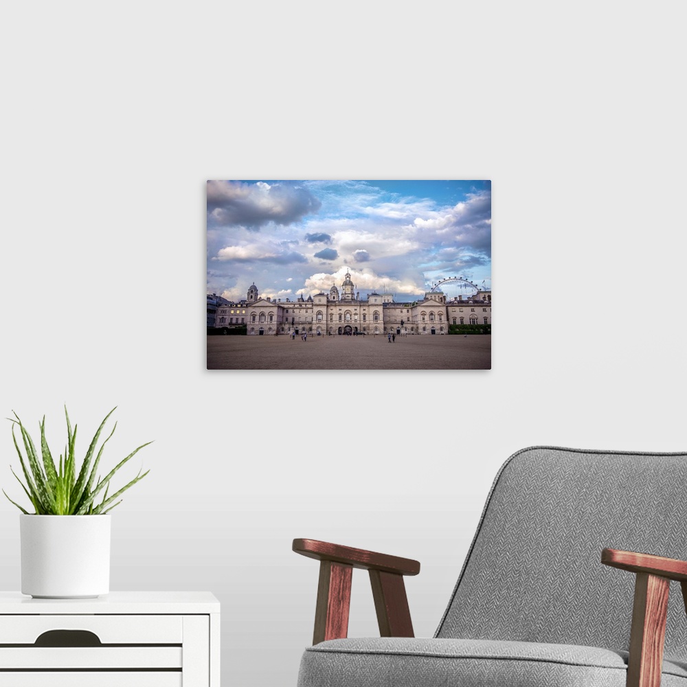 A modern room featuring View of Horse Guards building in London, England against a bright blue sky.