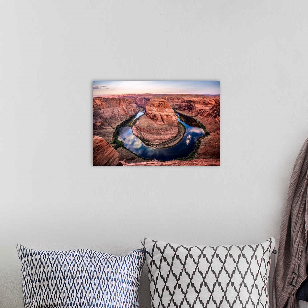 A bohemian room featuring Landscape photograph of Horseshoe Bend in Page, Arizona with blue cloudy skies reflecting into th...