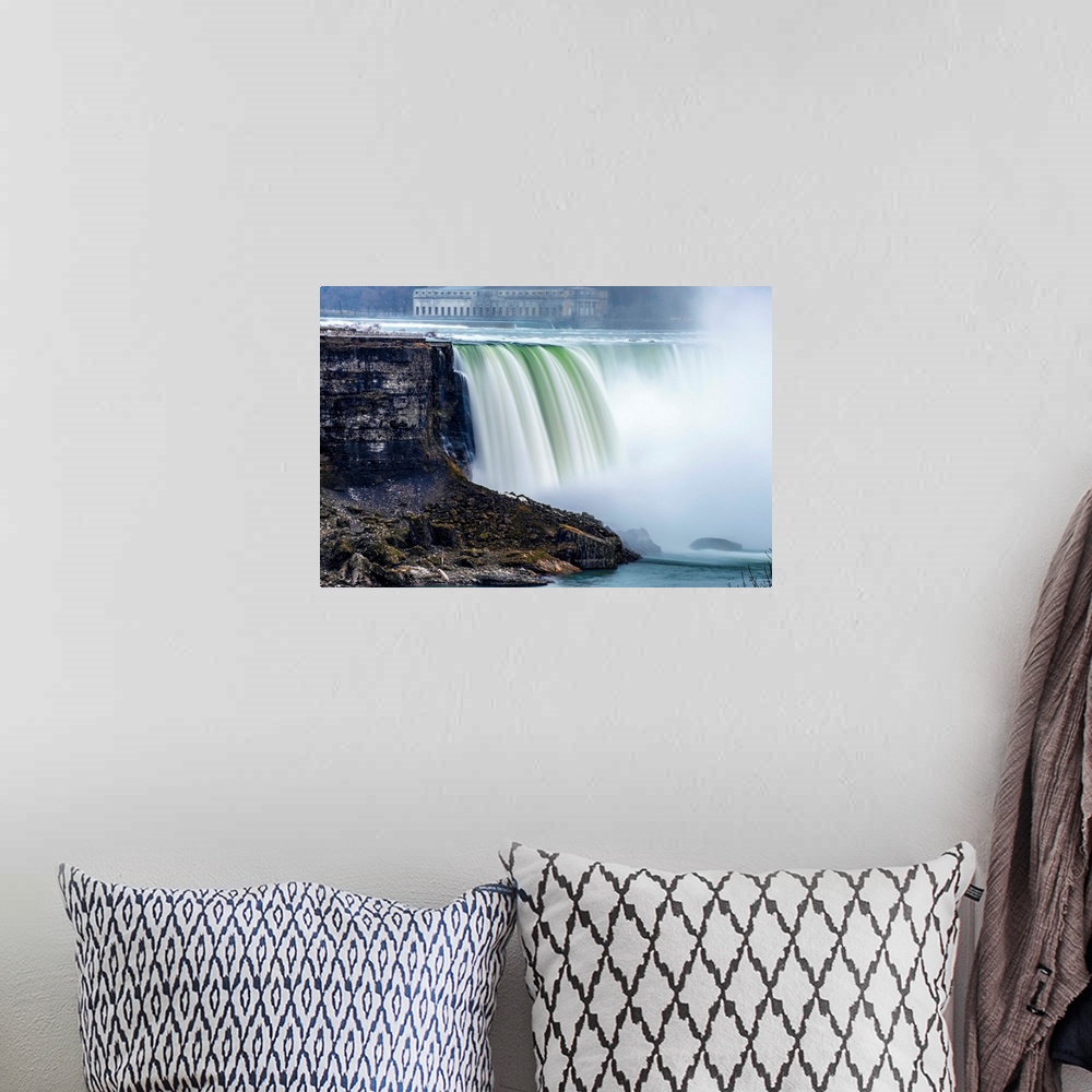A bohemian room featuring View of Horseshoe Falls at Niagara Falls with former Toronto power generating station in the back...
