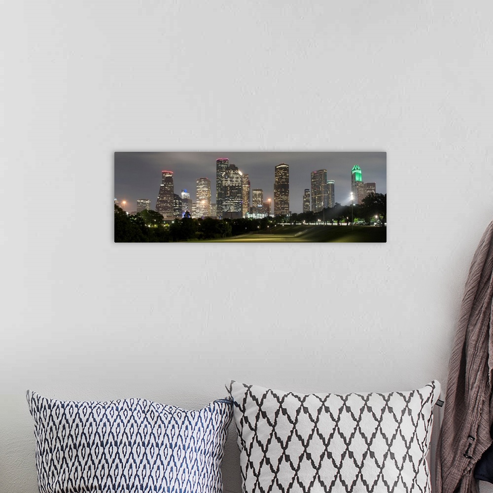 A bohemian room featuring Panoramic photograph of the Houston TX skyline at night from Eleanor Tinsley Park.