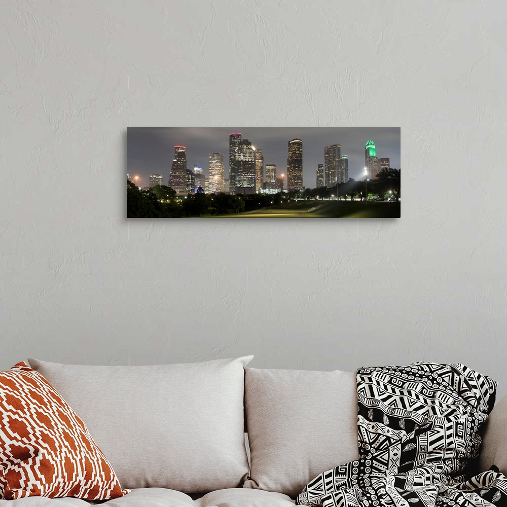 A bohemian room featuring Panoramic photograph of the Houston TX skyline at night from Eleanor Tinsley Park.
