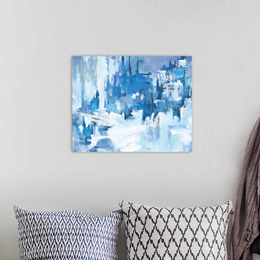 A bohemian room featuring A contemporary abstract painting using multiple tones of blue creating a sort of icy landscape.