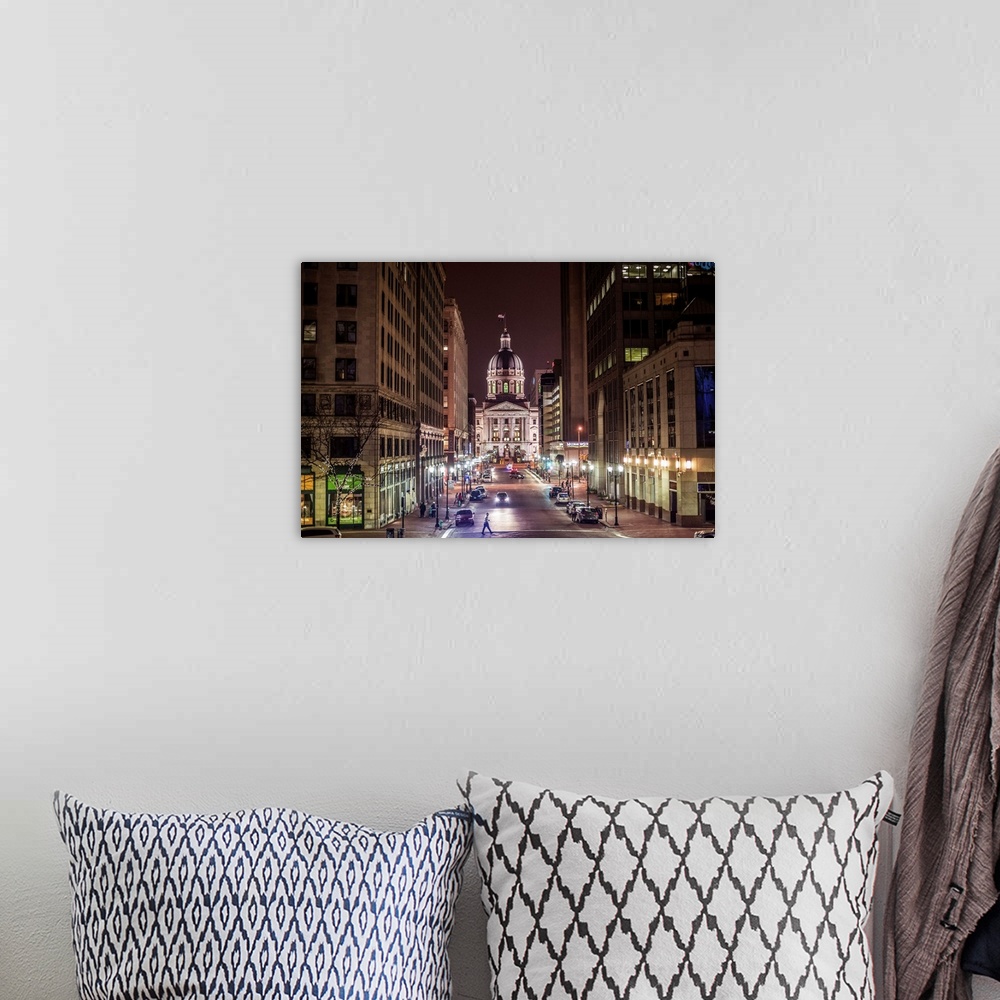 A bohemian room featuring Photo of the Indiana State House at night.