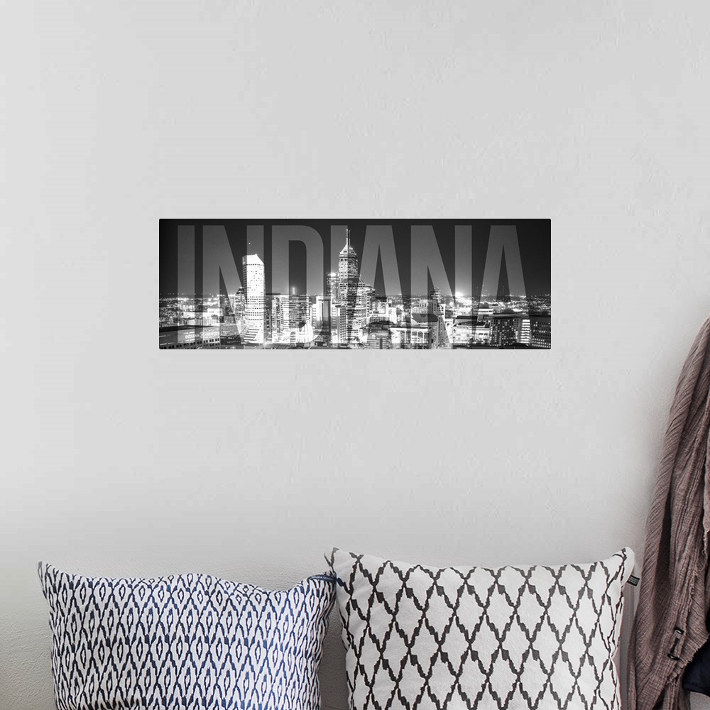 A bohemian room featuring Transparent typography art overlay against a photograph of the Indianapolis city skyline.
