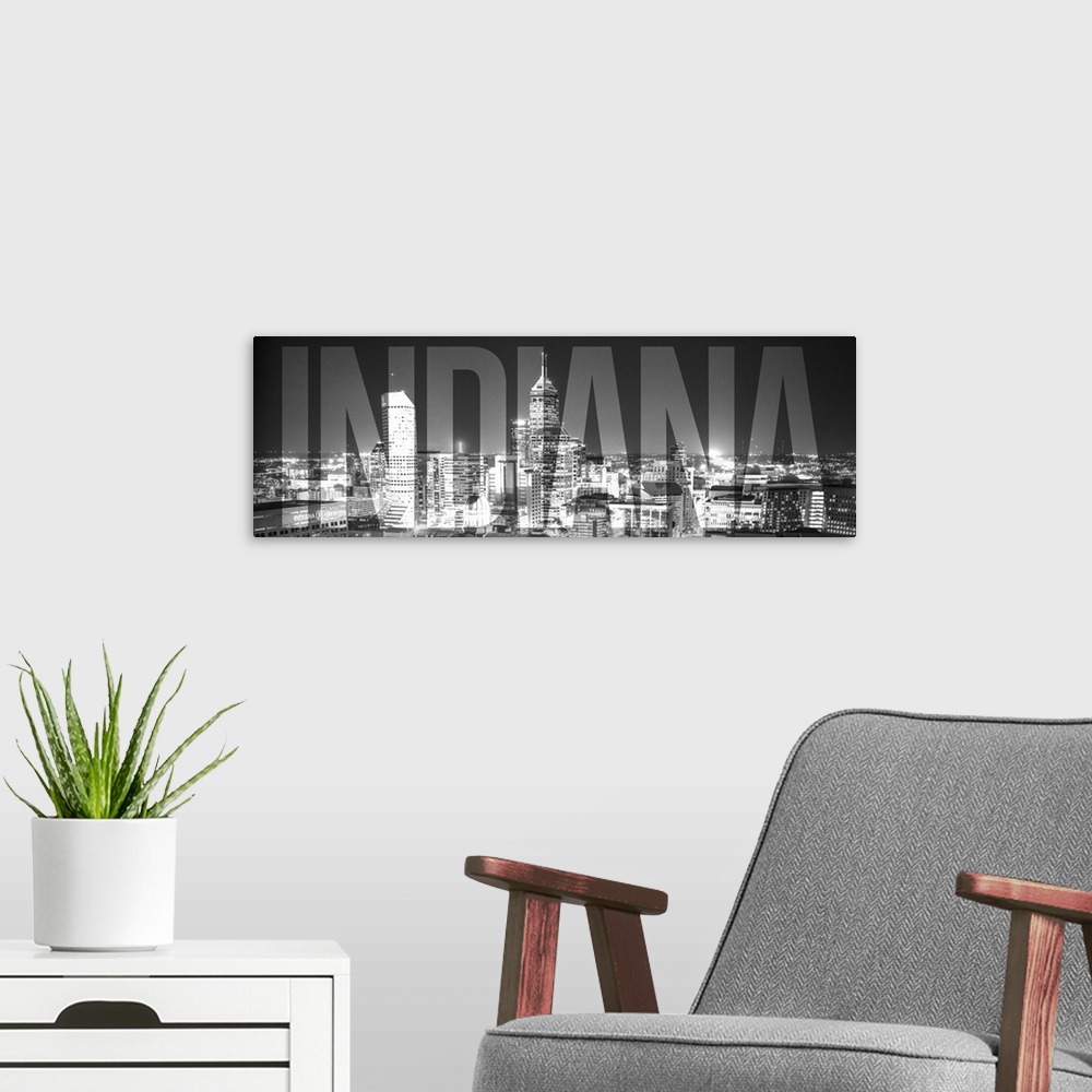 A modern room featuring Transparent typography art overlay against a photograph of the Indianapolis city skyline.