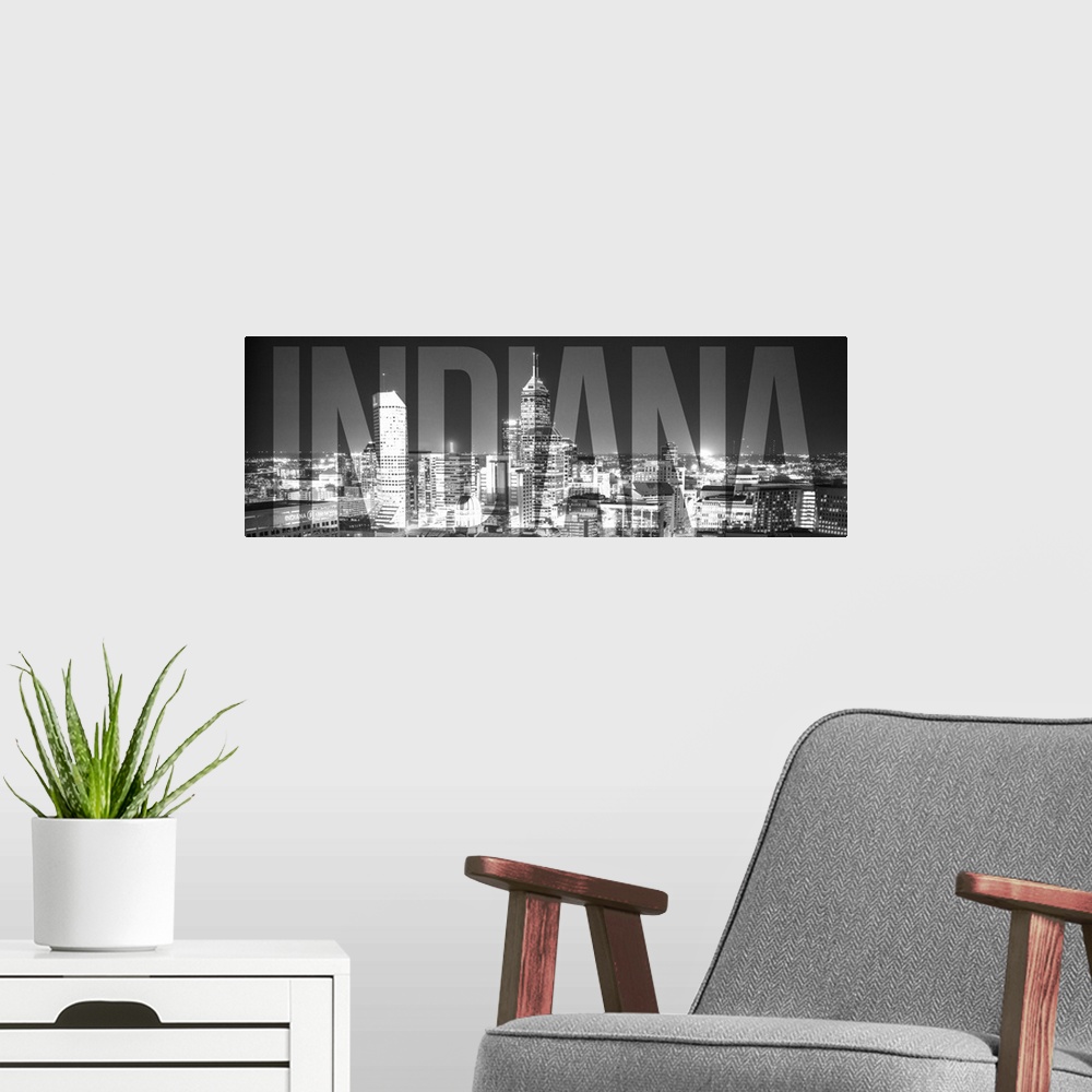 A modern room featuring Transparent typography art overlay against a photograph of the Indianapolis city skyline.