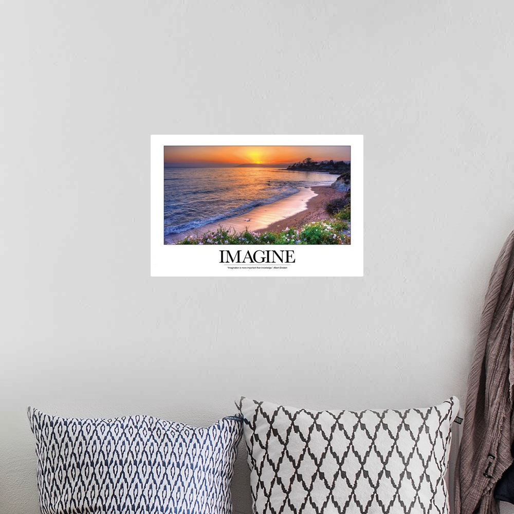 A bohemian room featuring This photograph is taken of a sunset over the ocean and beach with the word Imagine written out b...