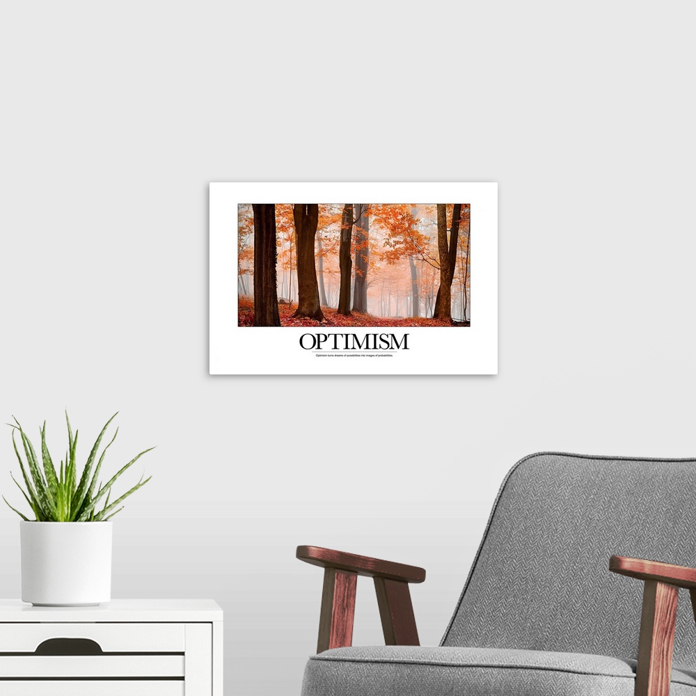 A modern room featuring Motivational poster featuring a misty forest in autumn and the text, "Optimism: Optimism turns dr...