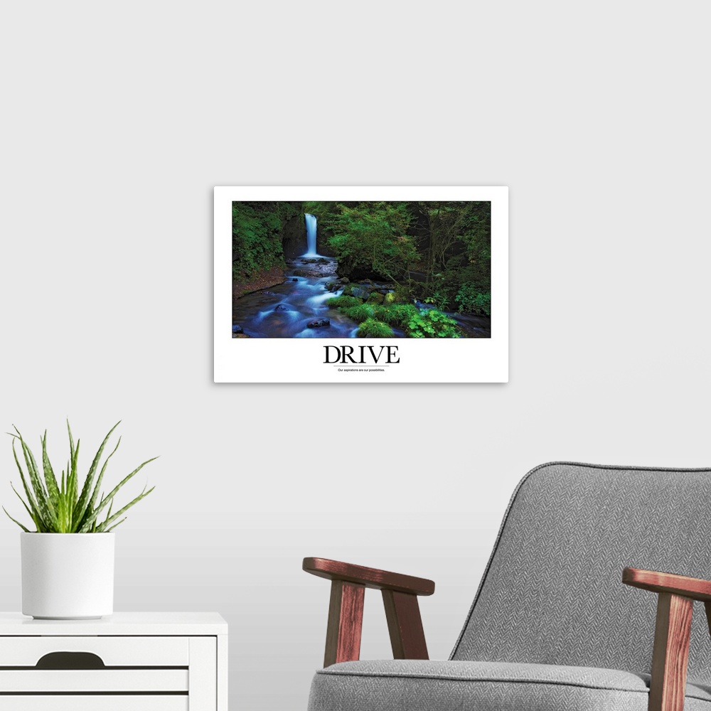 A modern room featuring A simple poster with a message of inspiration shows a waterfall and stream in a North American fo...