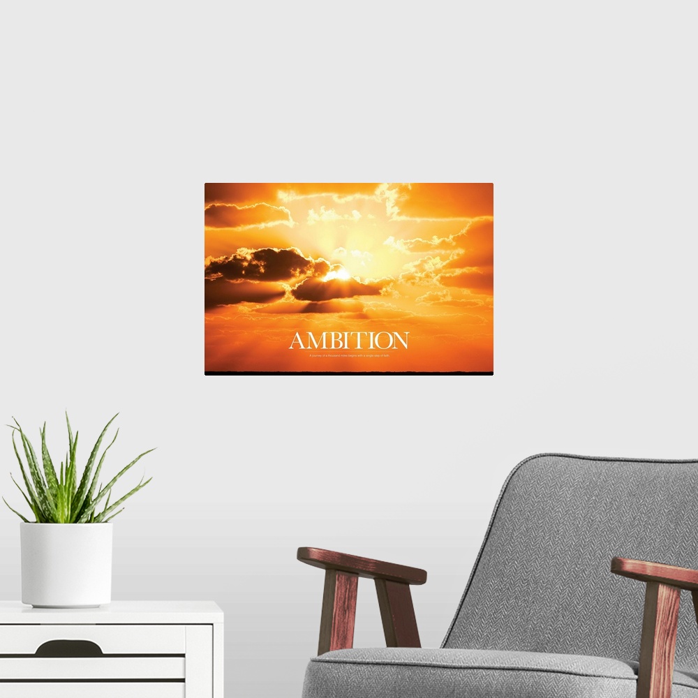 A modern room featuring Large print of a vividly warm sunset with the sun shining through clouds and text underneath it.