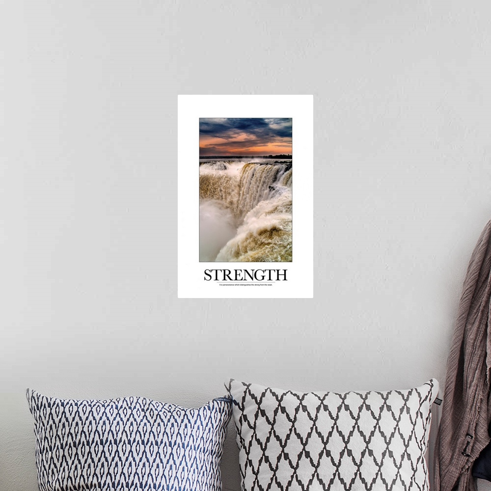 A bohemian room featuring Big, vertical motivational wall hanging of large waterfalls beneath a vibrant sunset.  The image ...
