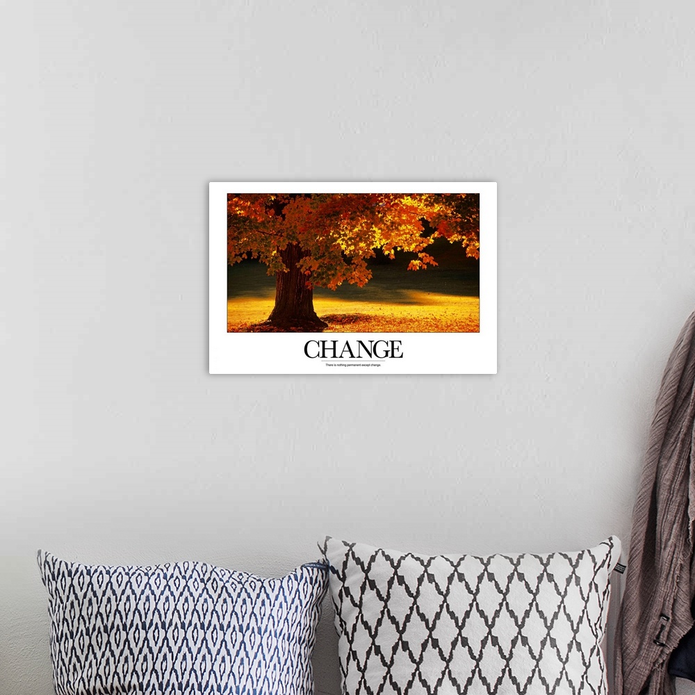 A bohemian room featuring Large inspirational wall art of an autumn tree full of colorful leaves and the word "Change" at t...