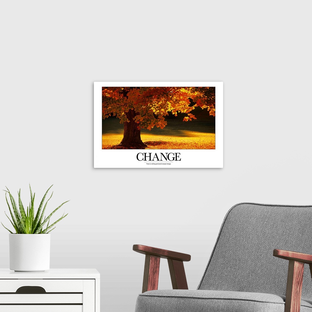 A modern room featuring Large inspirational wall art of an autumn tree full of colorful leaves and the word "Change" at t...