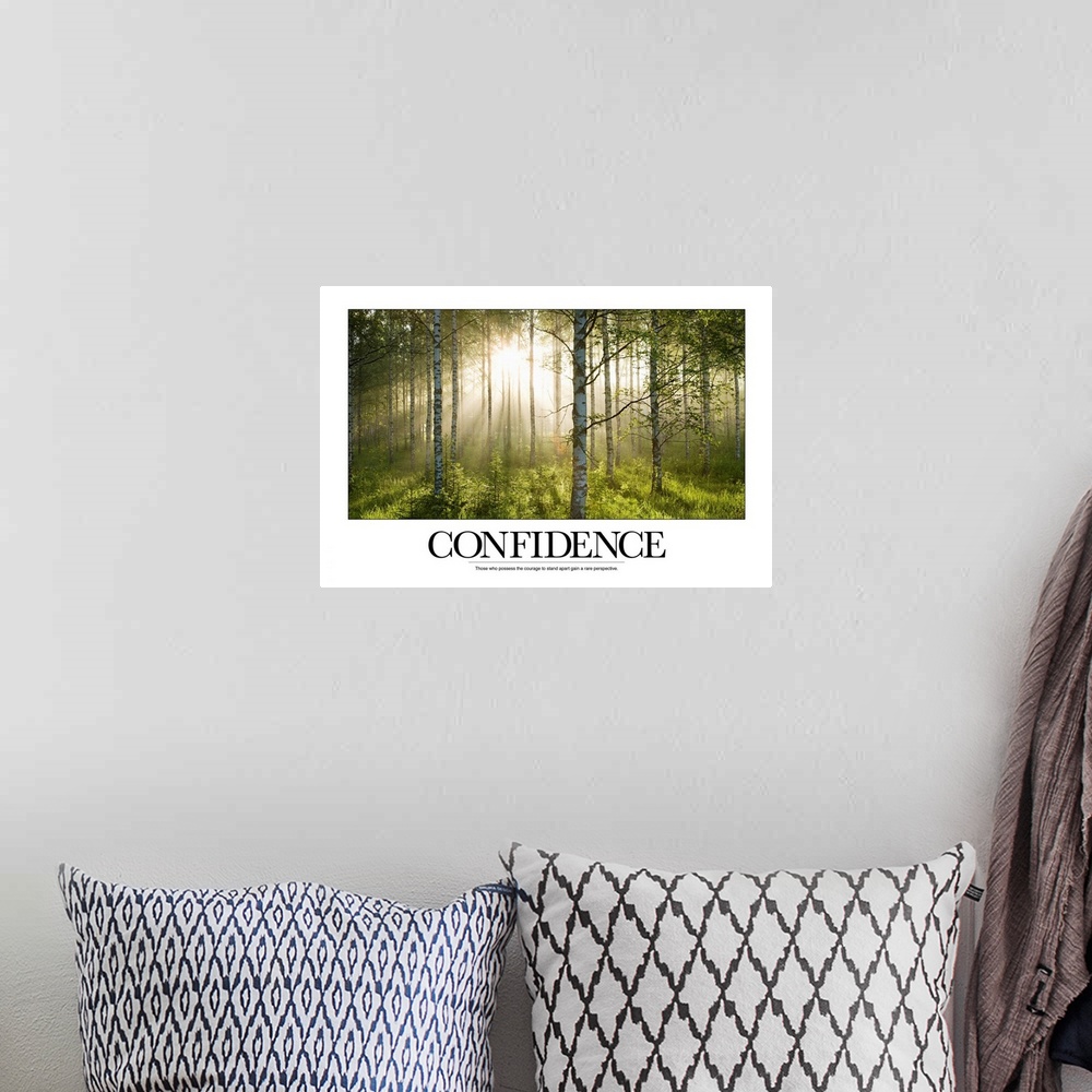 A bohemian room featuring Wall art of a forest with sun shining through past leaves and tree trunks with the text: "Confide...
