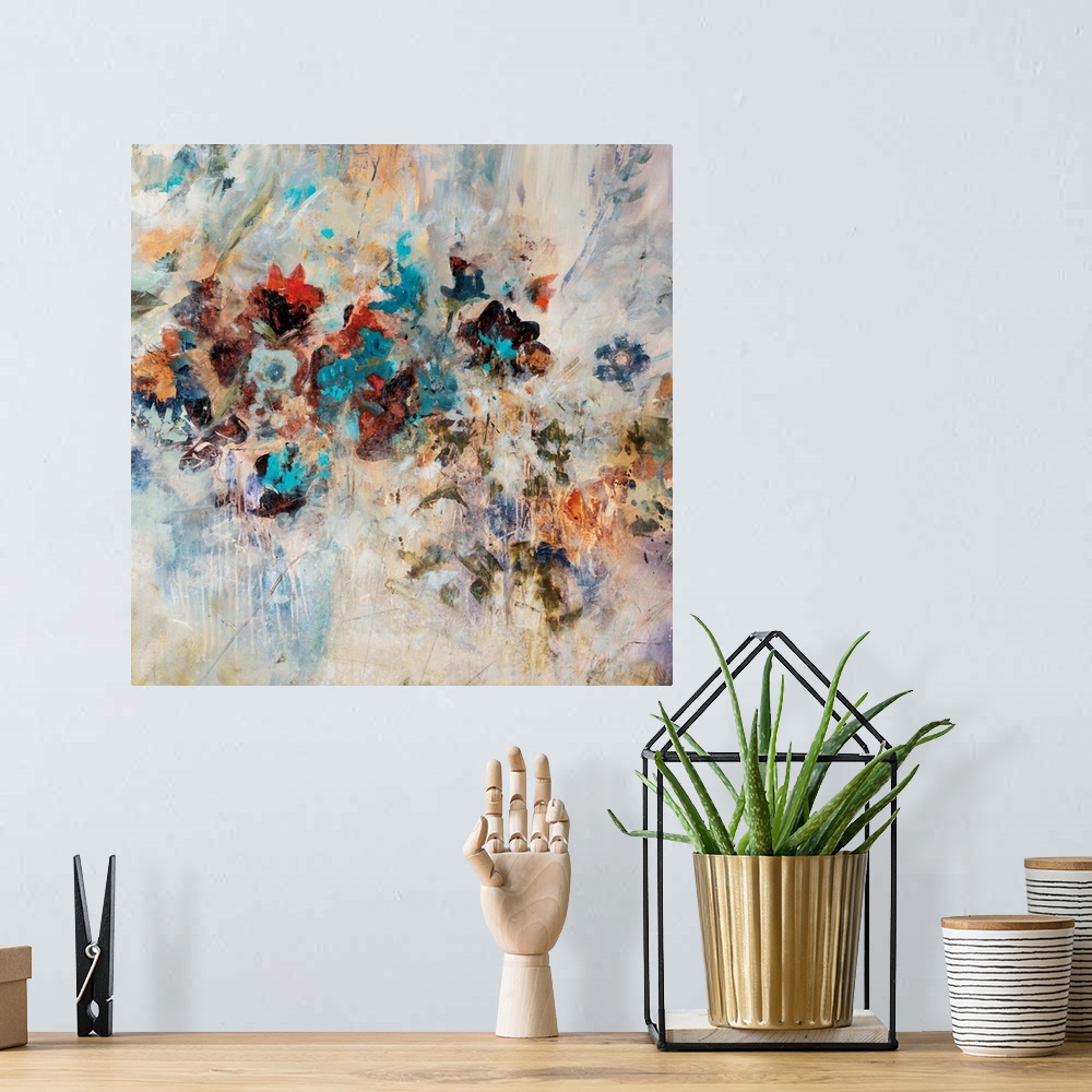 A bohemian room featuring Abstract art piece of flowers pushing through the textured cream background.