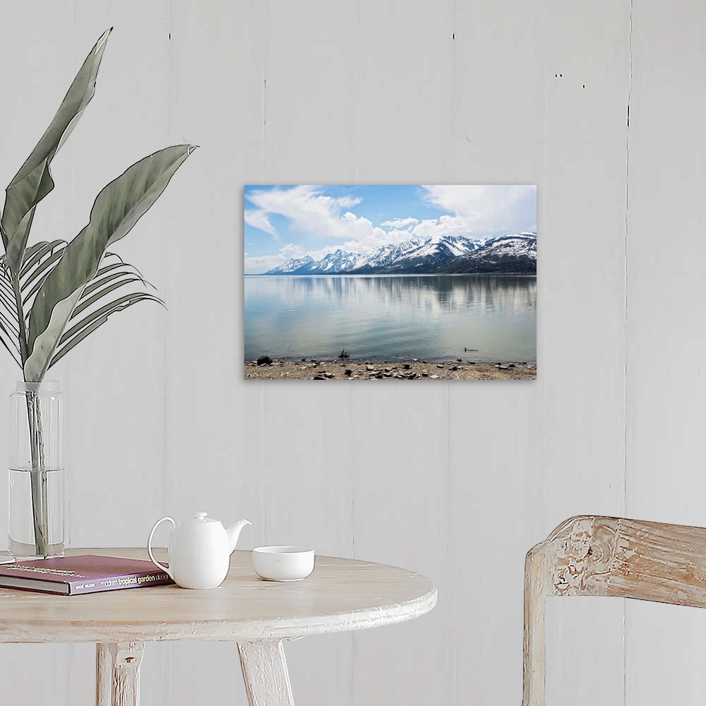 A farmhouse room featuring Landscape photograph of Jackson Lake with the Grand Teton mountains in the background.