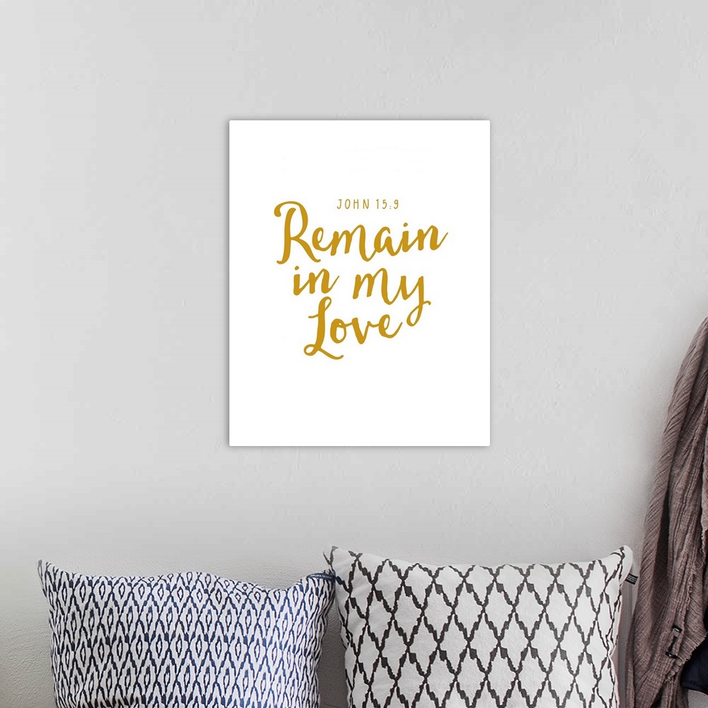 A bohemian room featuring Handlettered Bible verse reading Remain in my love.