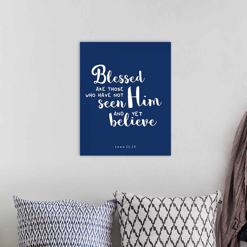 A bohemian room featuring Handlettered Bible verse reading Blessed are those who have no seen Him and yet believe.