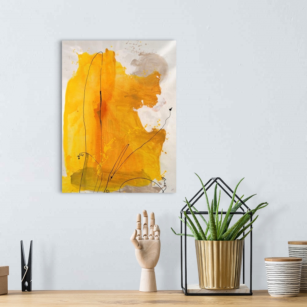 A bohemian room featuring Painting of a large abstract shape in golden tones with thin, swirling lines of paint that appear...