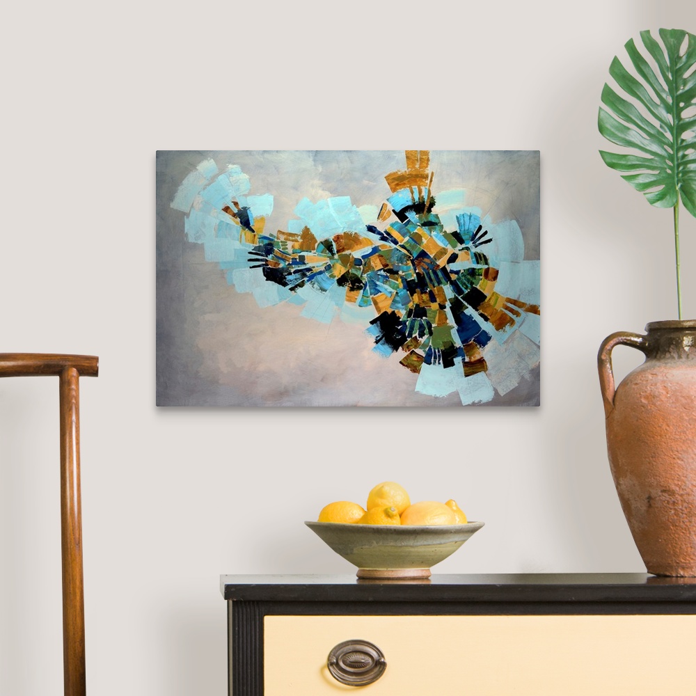 A traditional room featuring Fan like shapes radiate outward in this abstract painting on a horizontal wall hanging for the of...