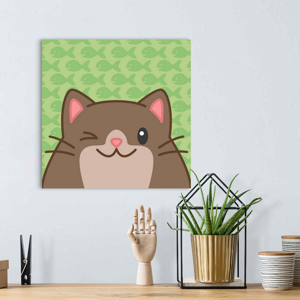 A bohemian room featuring A cute round brown kitty with a happy expression over a fish-patterned background.