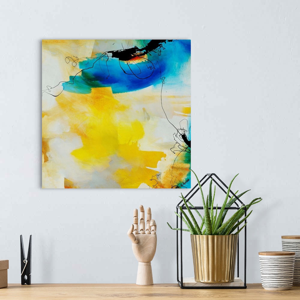 A bohemian room featuring Abstract painting of fluid black lines overtop of vibrant yellow and blue brushstrokes.