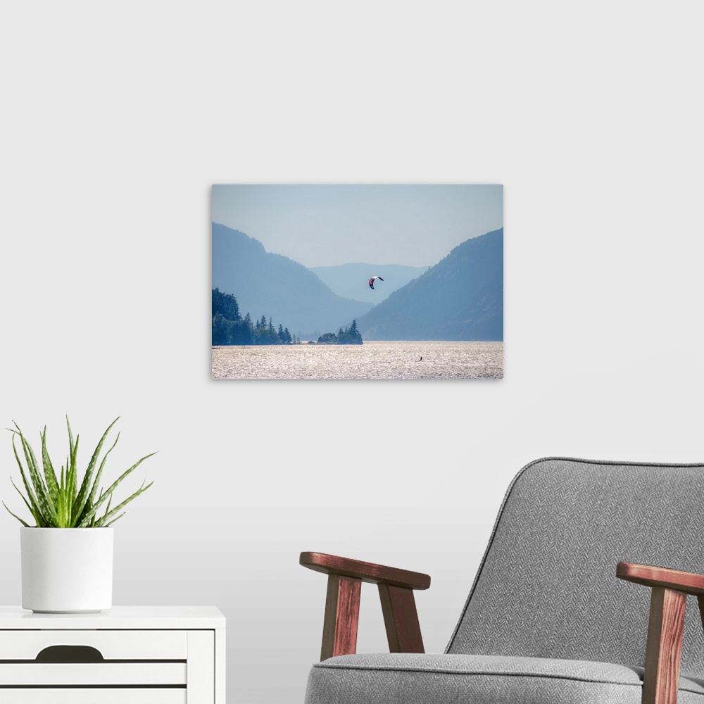 A modern room featuring View of a kitesurfer on Columbia River in Portland, Oregon.